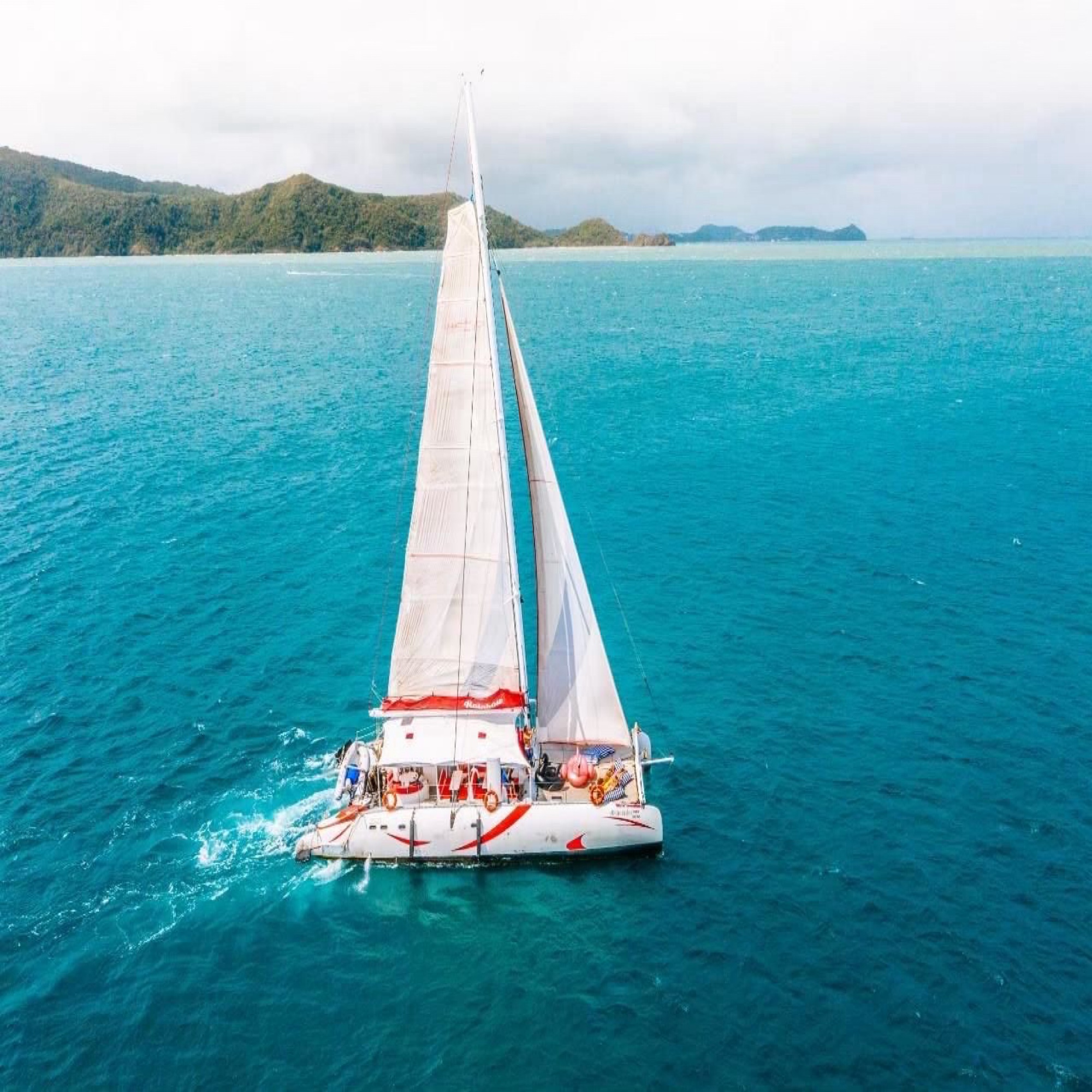 Smile Rainbow Coral Racha Maiton by Catamaran