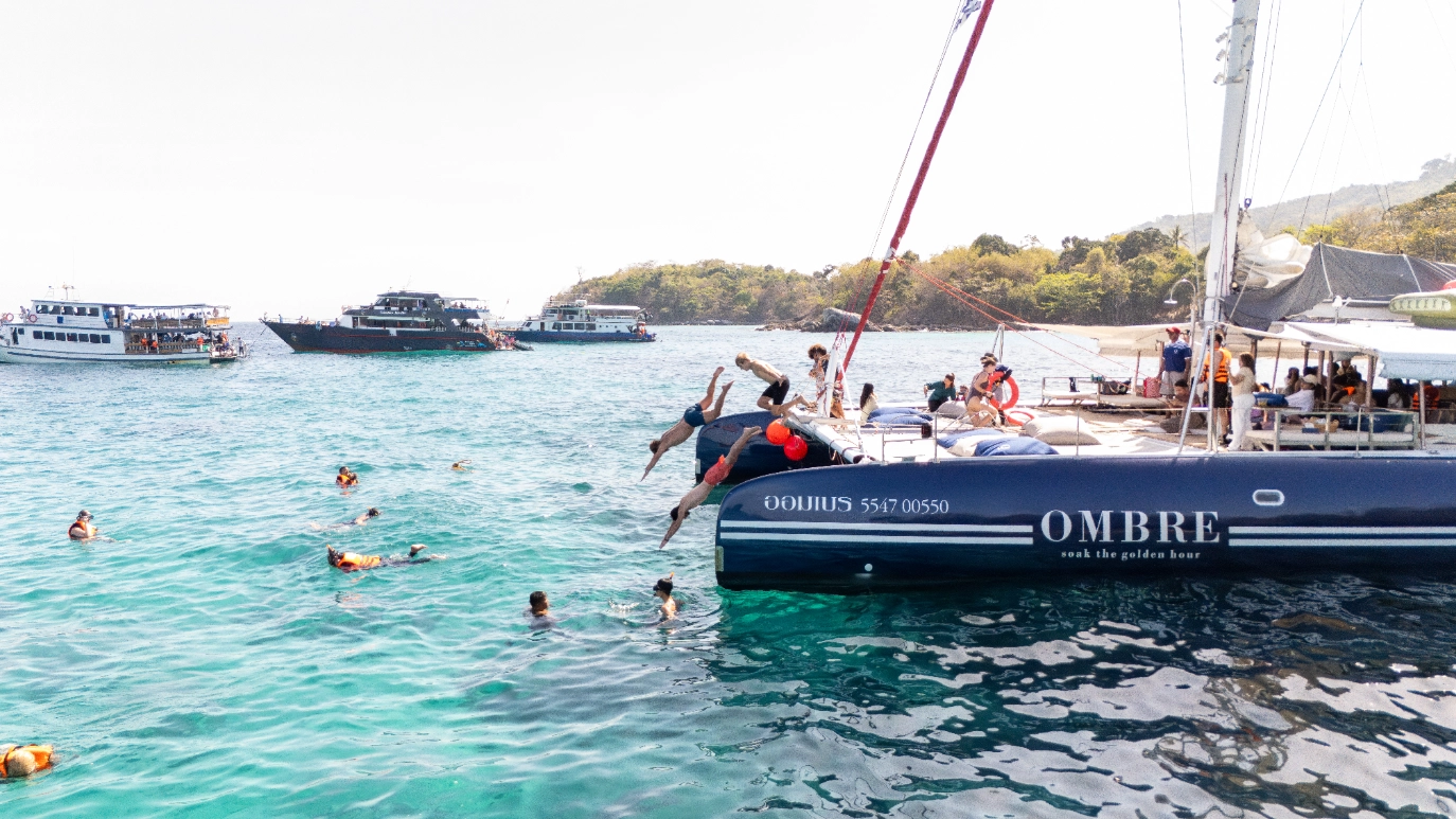 Phuket Racha & Coral Island Sunset Catamaran Cruise with Snorkeling & DJ Party by Ombre